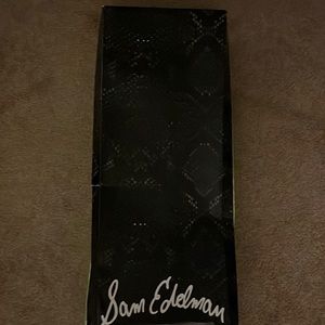 Black over knee boots.  Sam Edleman